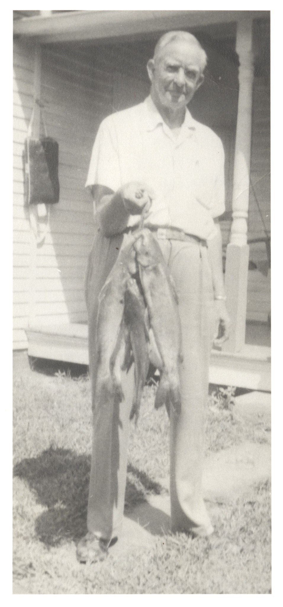 unknown man with fish.jpg