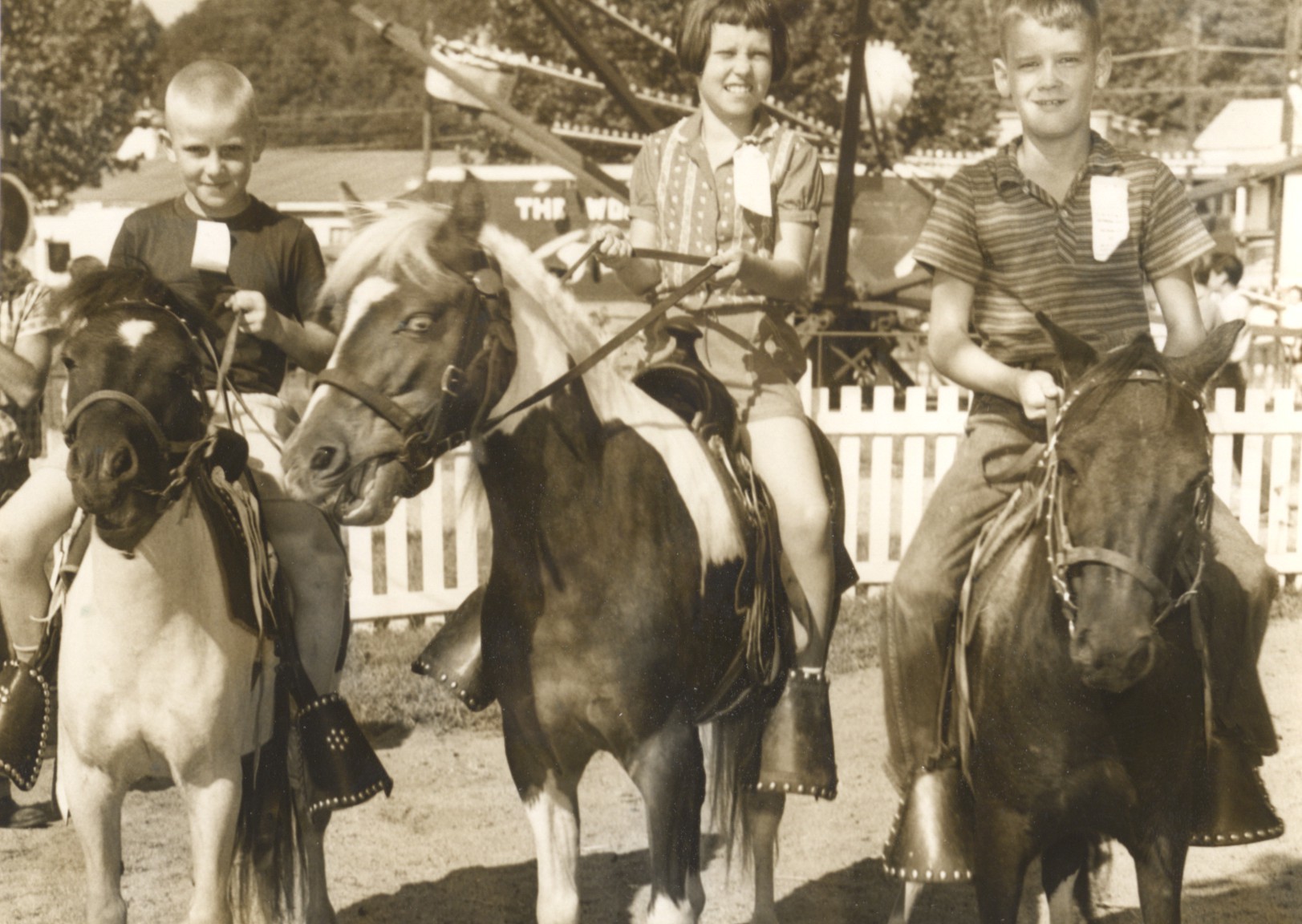 1960s kids riding ponies.jpg